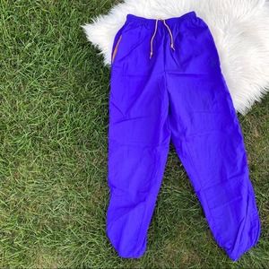 Vintage 90's Nike purple gold Wind Pants small